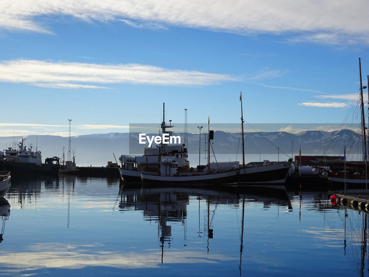FISHING BOATS IN HARBOR AT LAKE