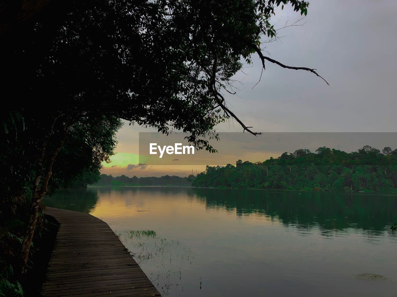 SCENIC VIEW OF LAKE DURING SUNSET