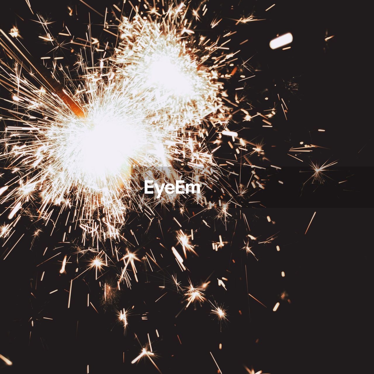 Blurred motion of burning sparkler at night