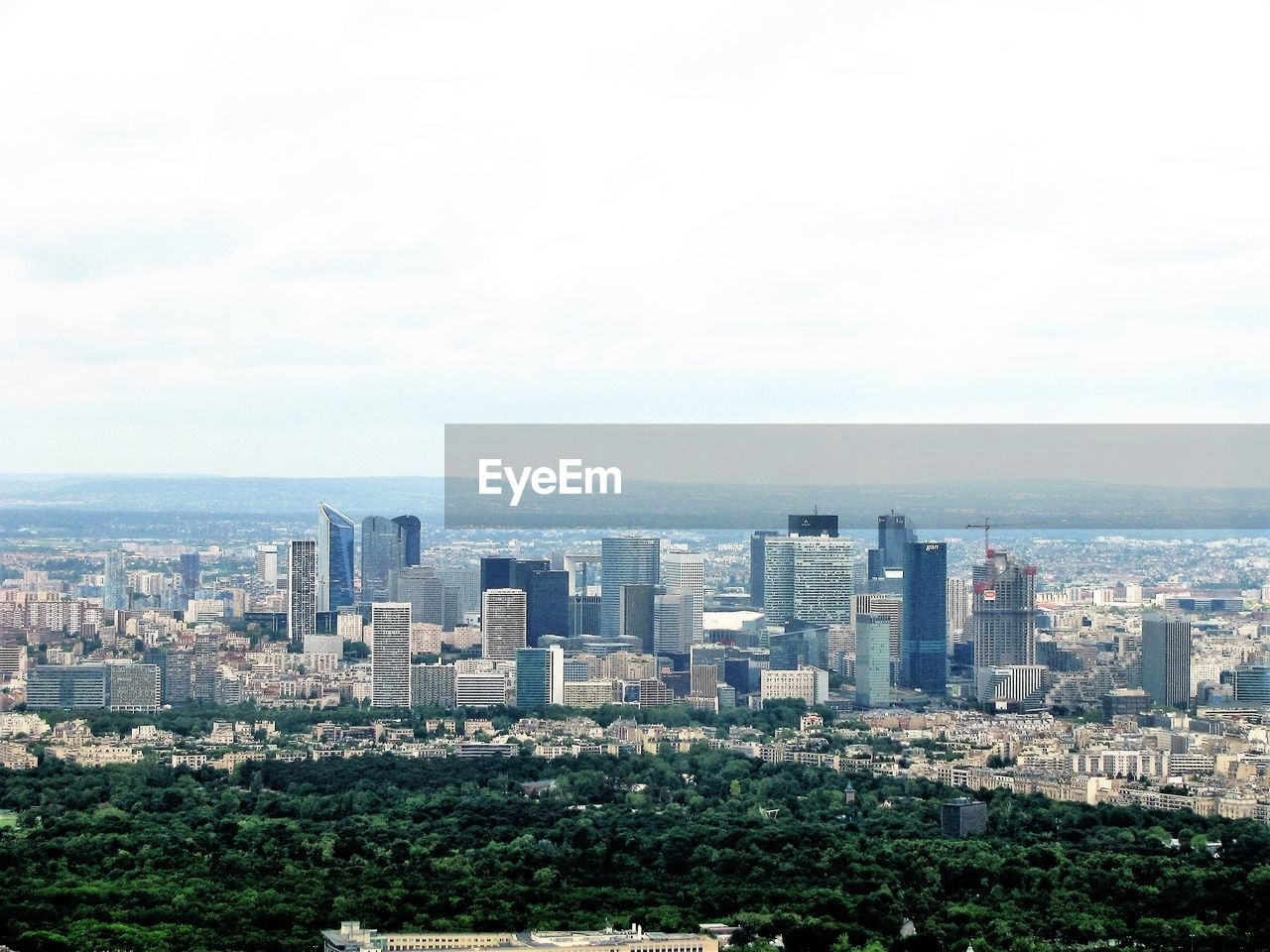 High angle view of city against cloudy sky