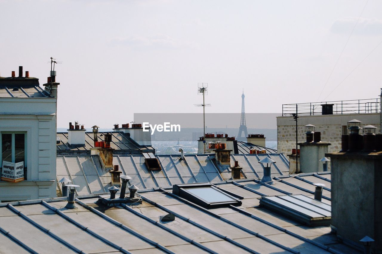 High angle view of buildings in city against clear sky