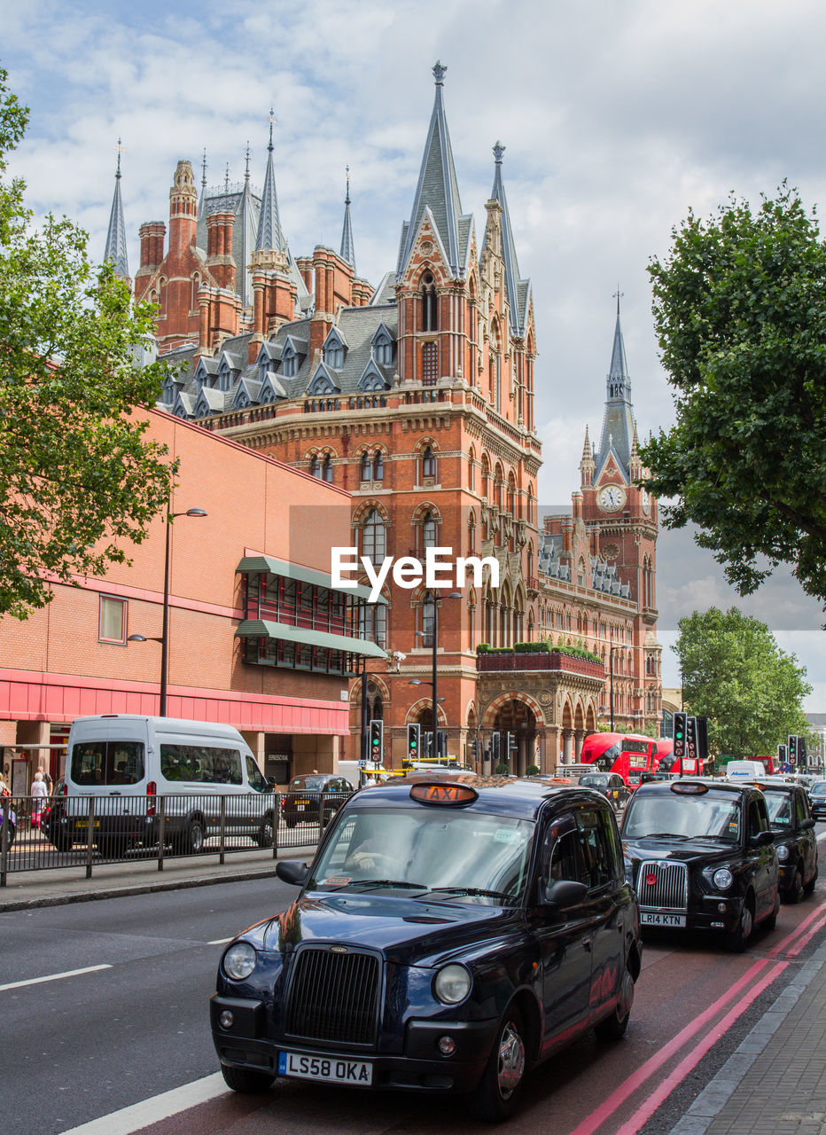 VIEW OF CITY STREET WITH BUILDINGS IN BACKGROUND