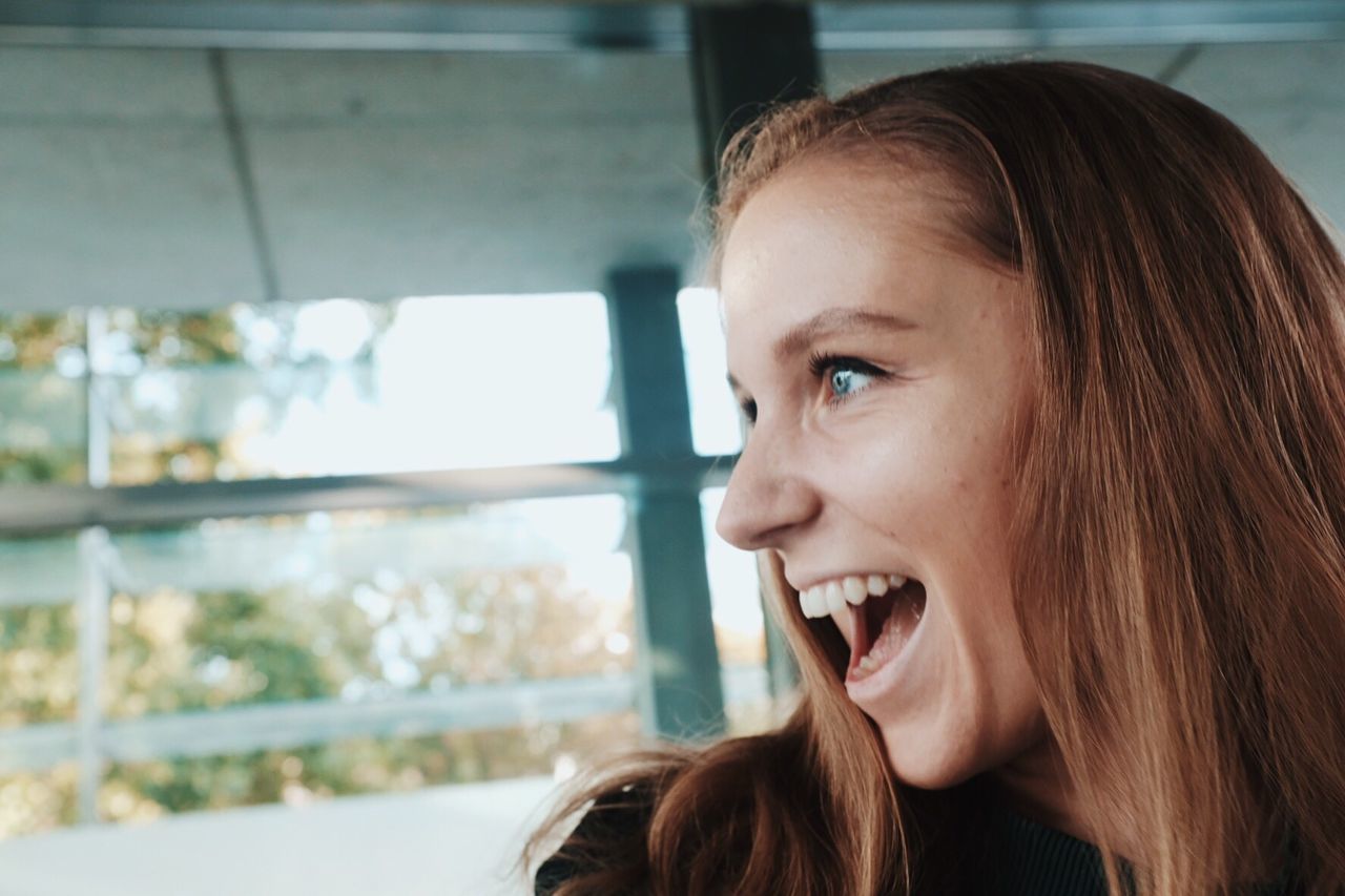 Close-up of happy young woman