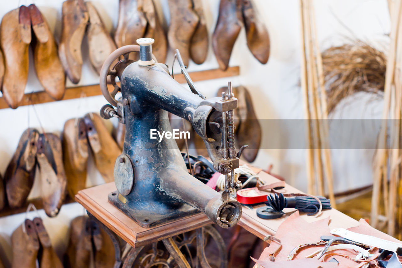 CLOSE-UP OF SHOES HANGING IN STORE