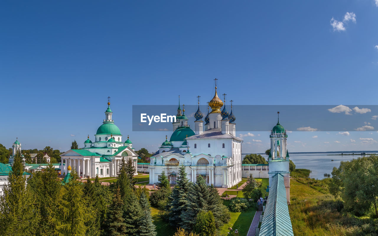 VIEW OF CATHEDRAL AGAINST BLUE SKY AND TREES