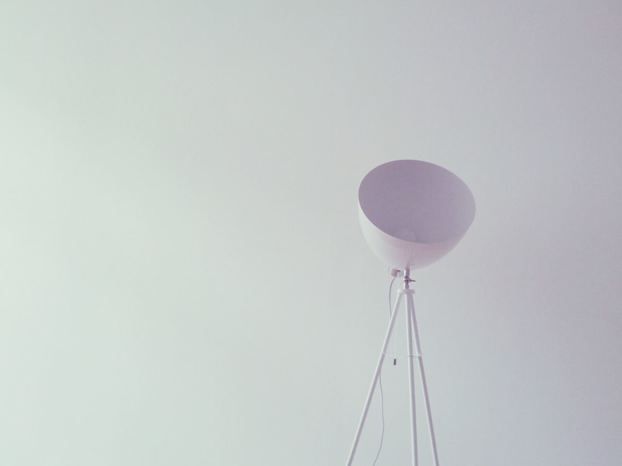 Low angle view of communication tower against clear sky