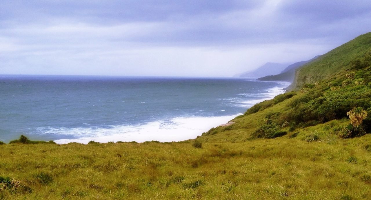 VIEW OF SEA AGAINST CLOUDY SKY