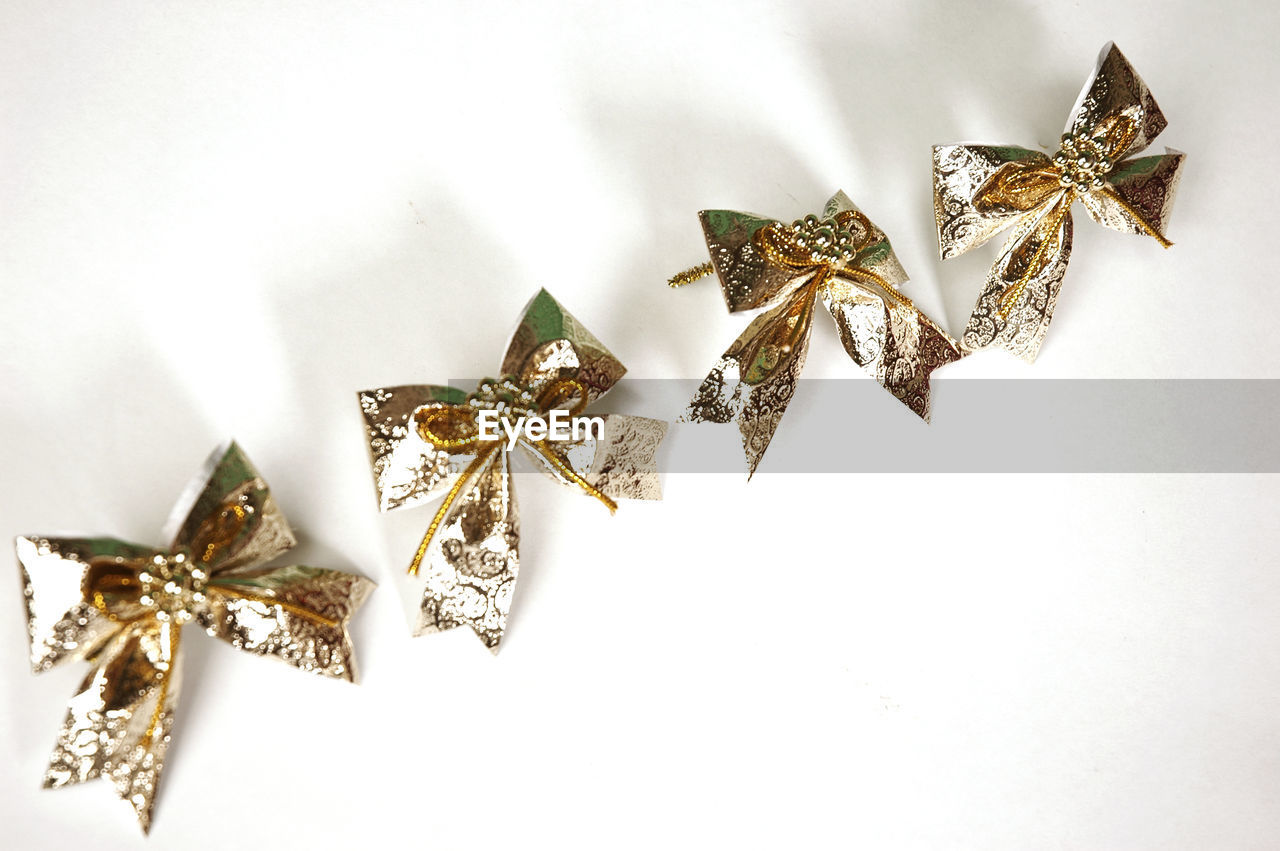 Close-up of christmas decoration against white background