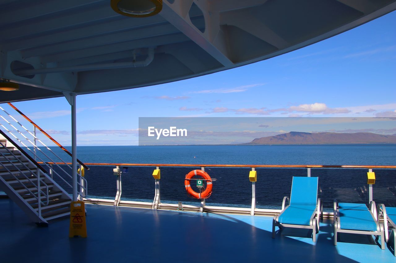 SCENIC VIEW OF SEA AGAINST SKY SEEN THROUGH BOAT