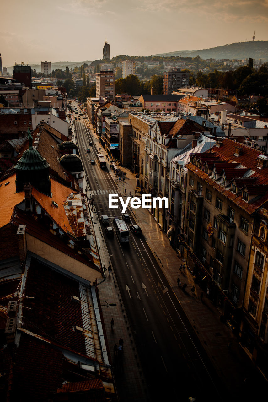 High angle view of street amidst buildings in city