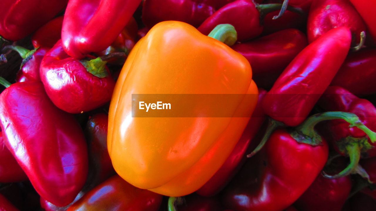 Close-up of red bell peppers for sale in market