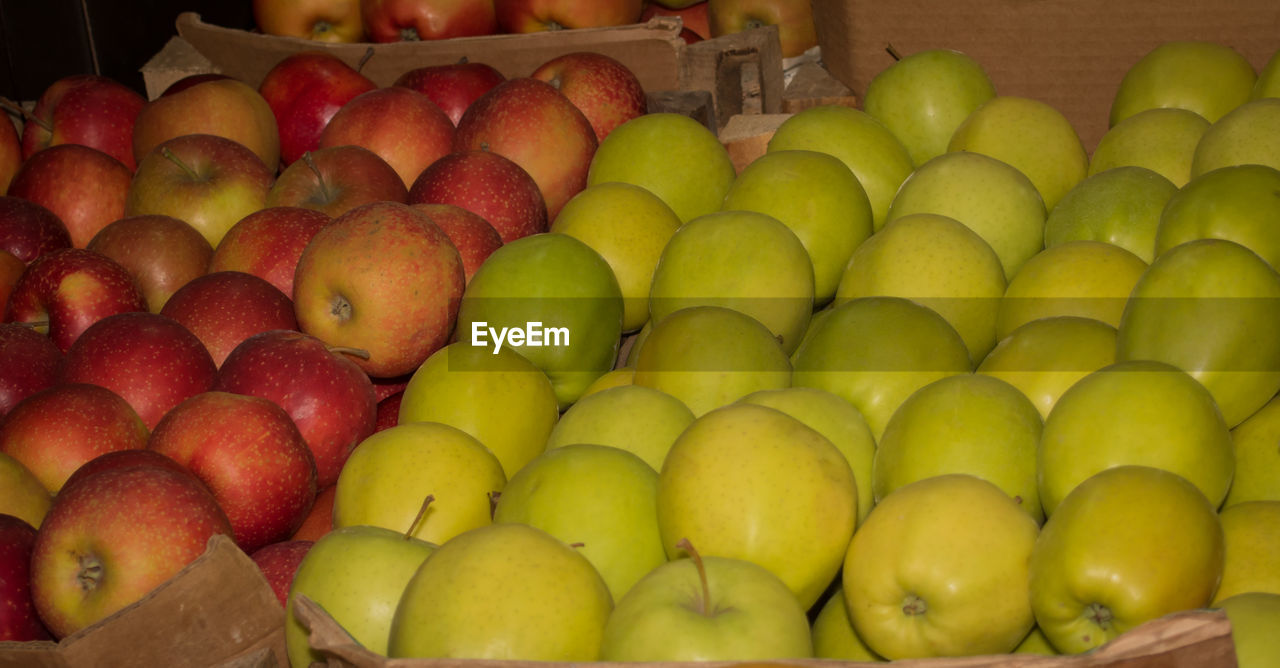 Apples for sale at market stall