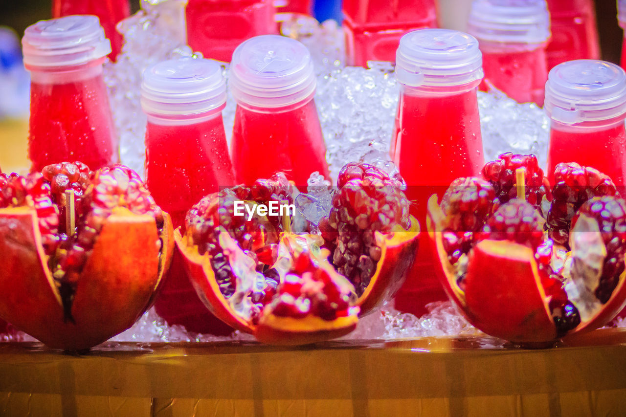 CLOSE-UP OF FRUITS SERVED ON TABLE AT HOME