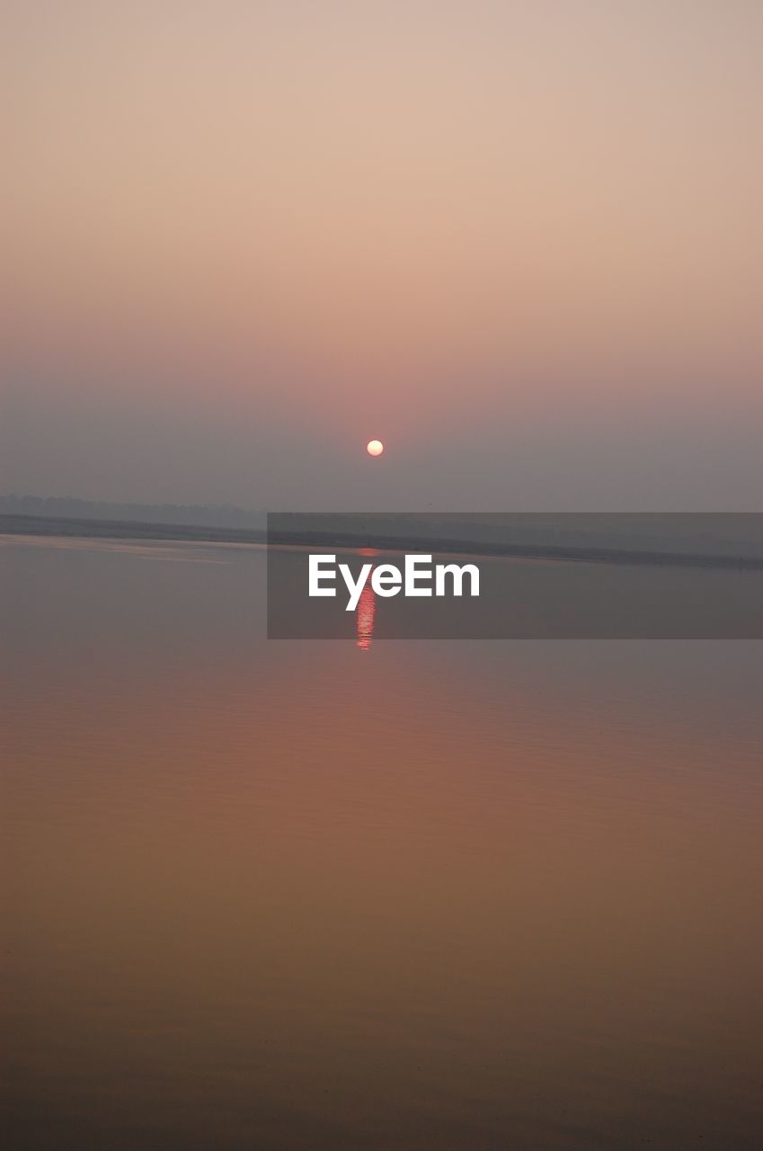 SCENIC VIEW OF SEA DURING SUNSET