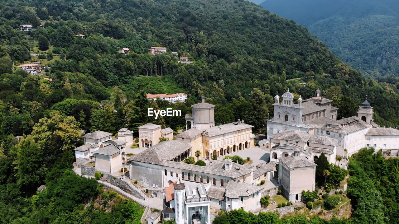 Aero view of beautiful shrine, ancient temple complex, big castle, sanctuary located in mountains 