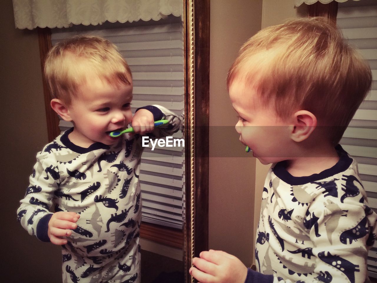 Boy brushing his teeth