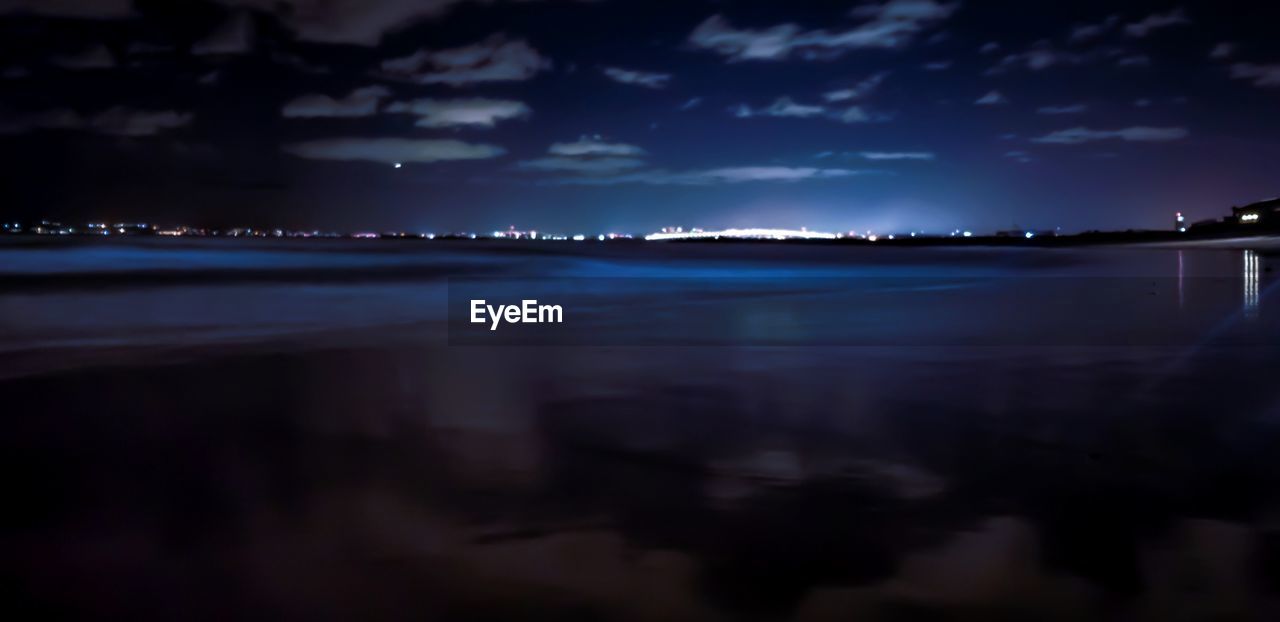 VIEW OF SEA AGAINST SKY AT NIGHT