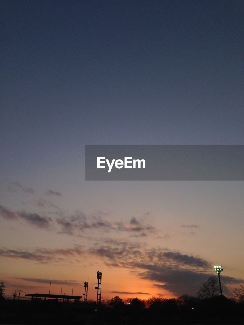 Scenic view of sea against sky at dusk