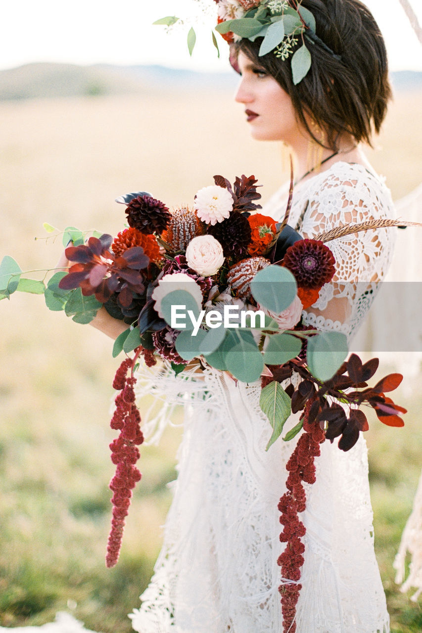 portrait of bride holding bouquet