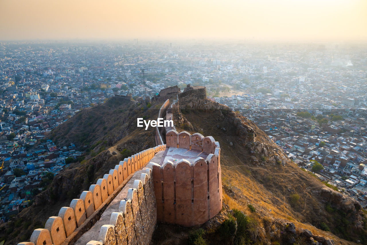 HIGH ANGLE VIEW OF BUILDINGS ON MOUNTAIN