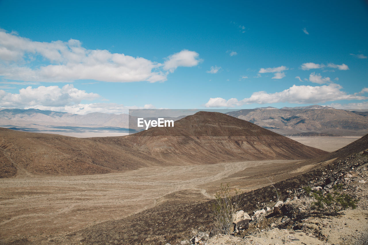 View of landscape against cloudy sky