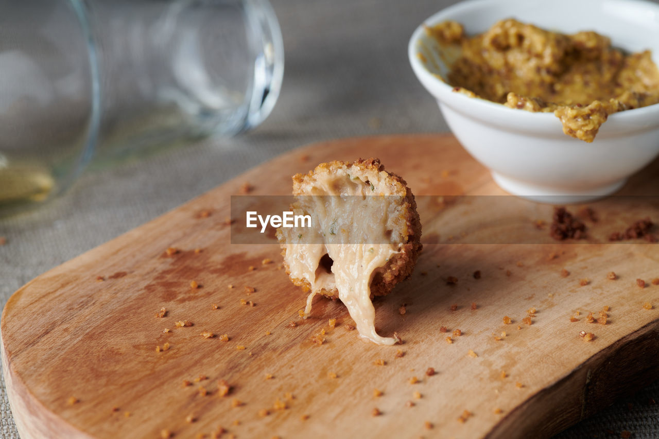 CLOSE-UP OF BREAD ON TABLE