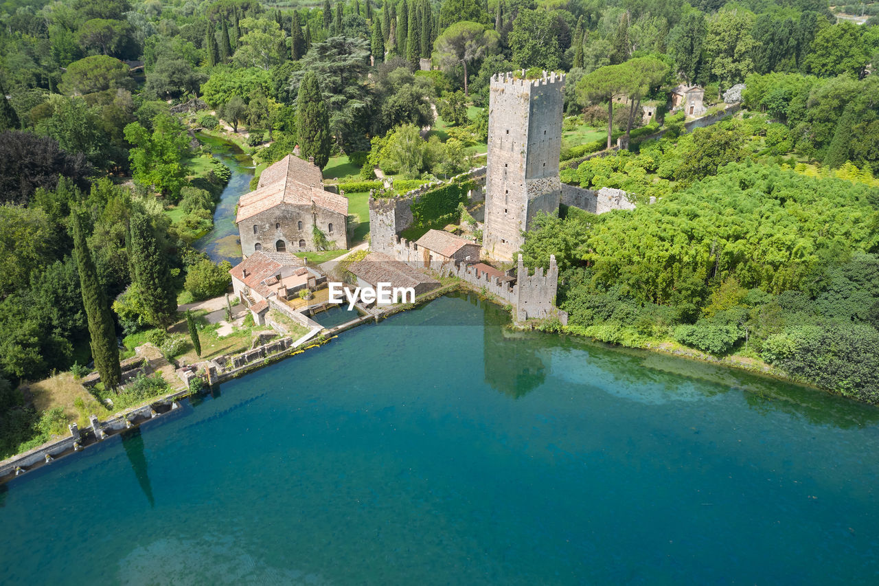 Transverse aerial view of the gardens of nymph in the country of cisterna di latina