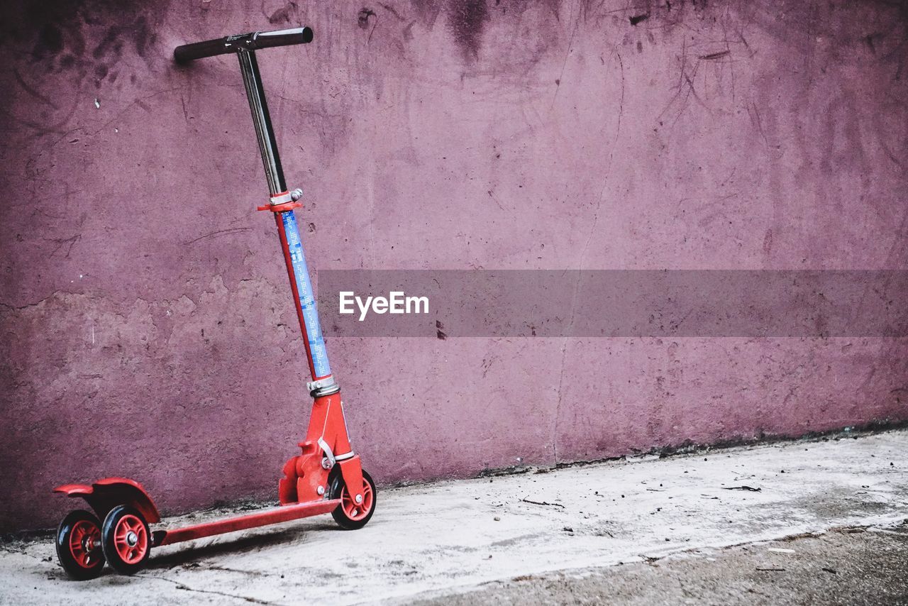 BICYCLE PARKED ON WALL