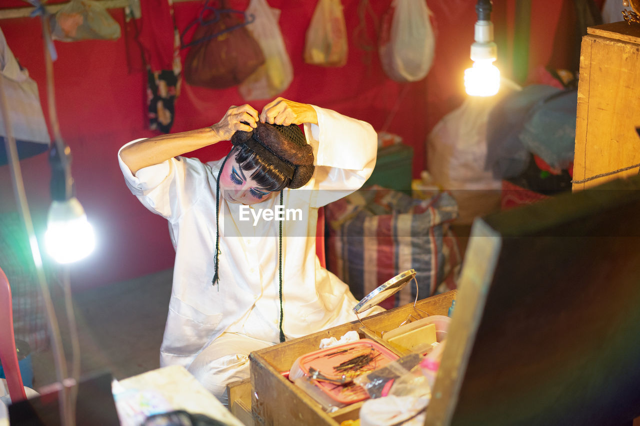 People standing in market stall