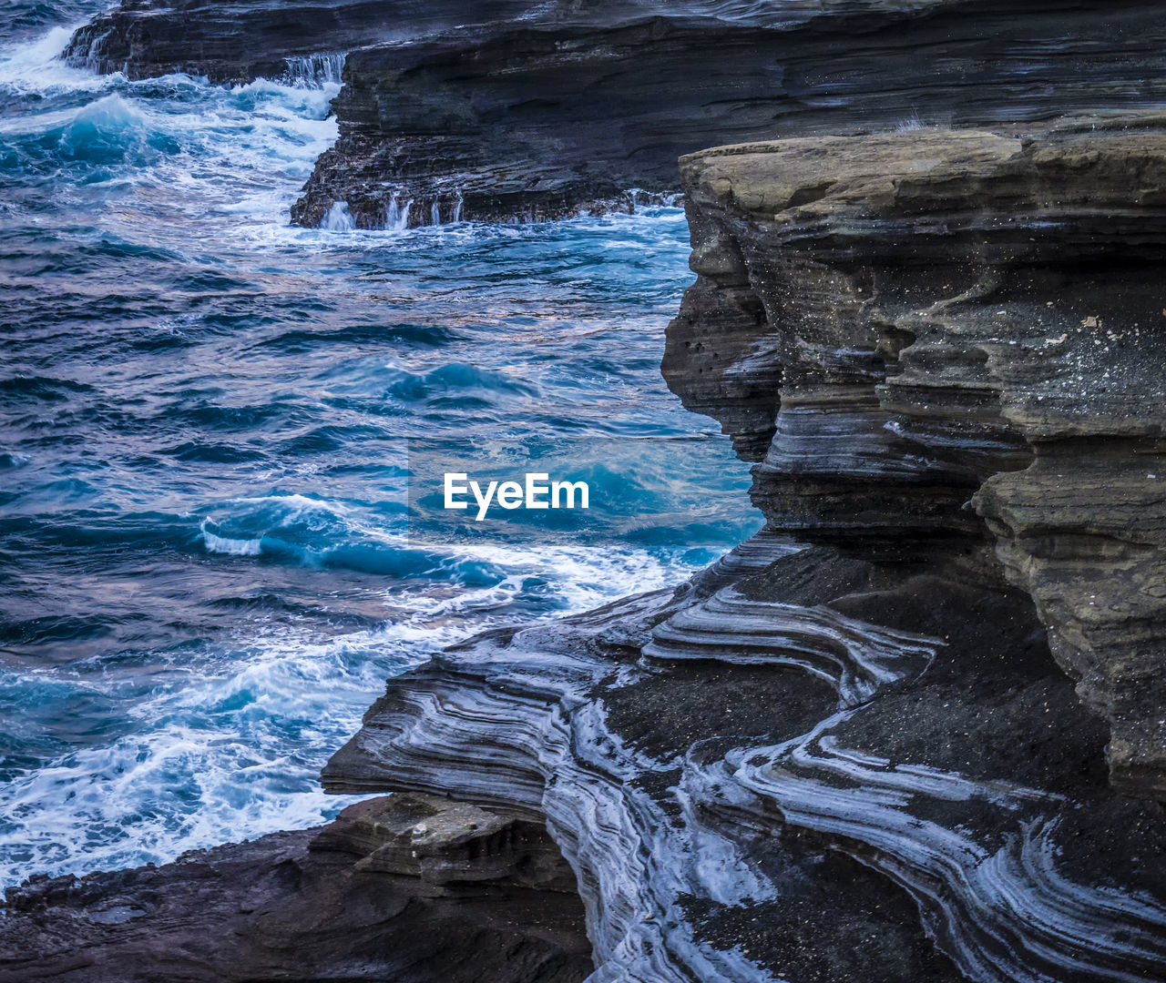 High angle view of volcanic rocky coastline