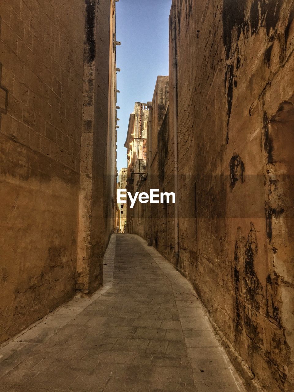 STREET AMIDST BUILDINGS IN CITY