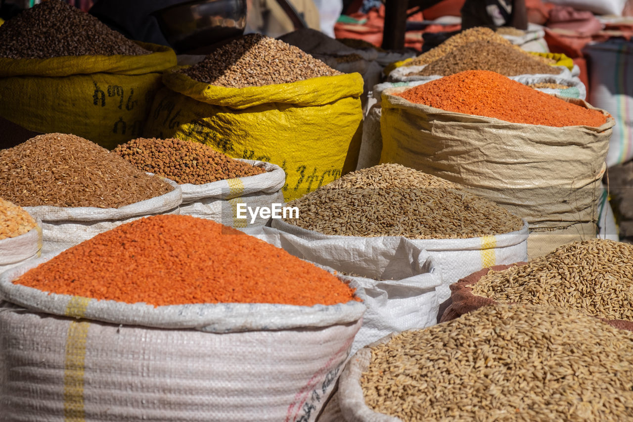 CLOSE-UP OF SPICES FOR SALE IN MARKET