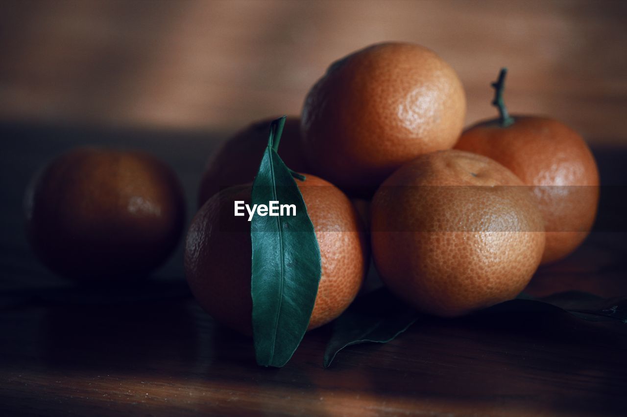 Close-up of oranges on table