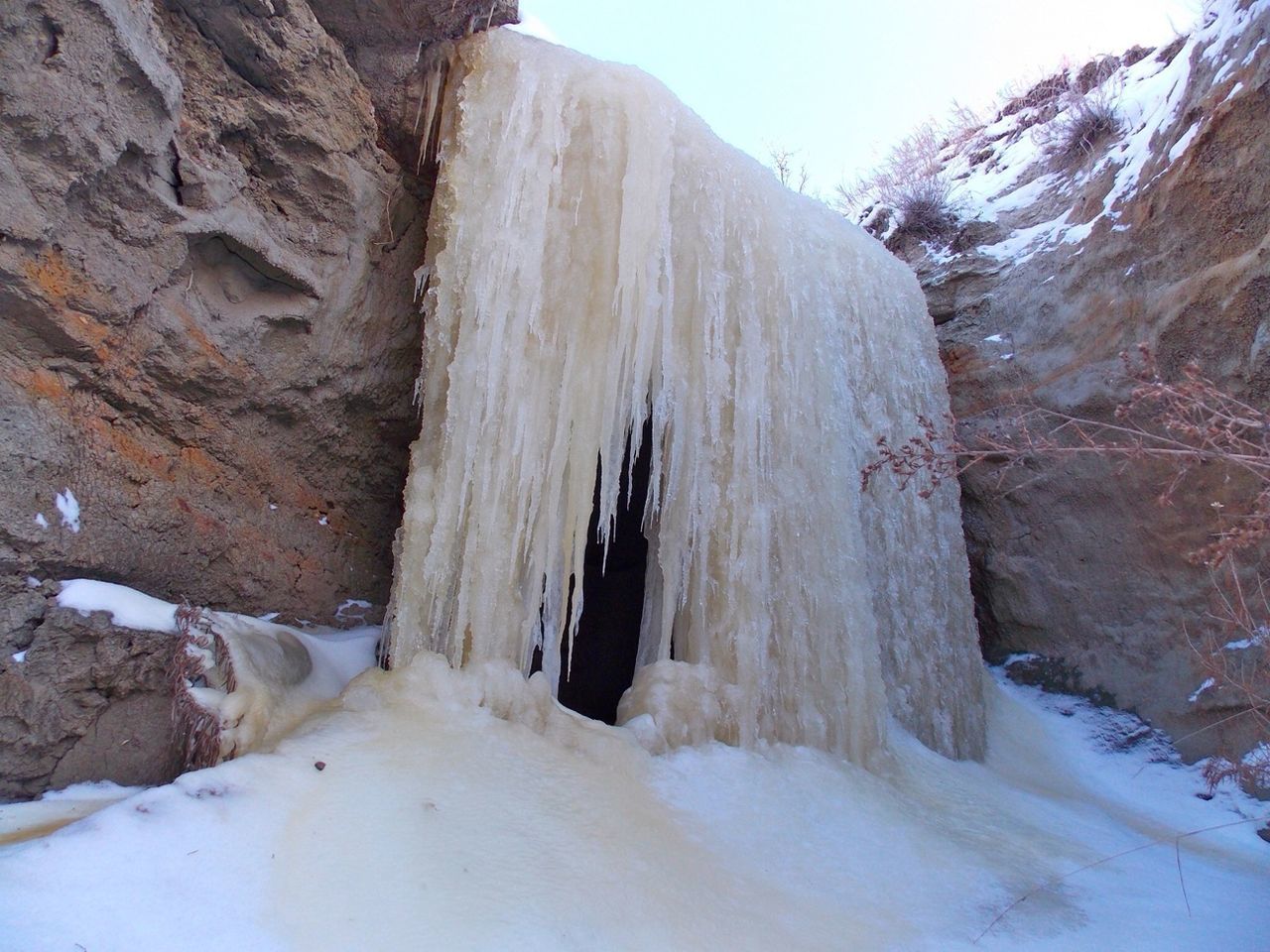 View of frozen waterfall