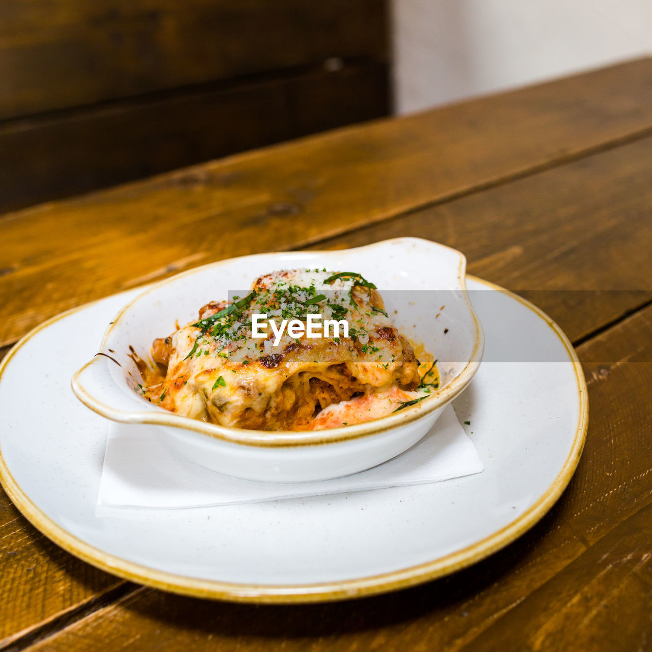 High angle view of lasagna in plate on table