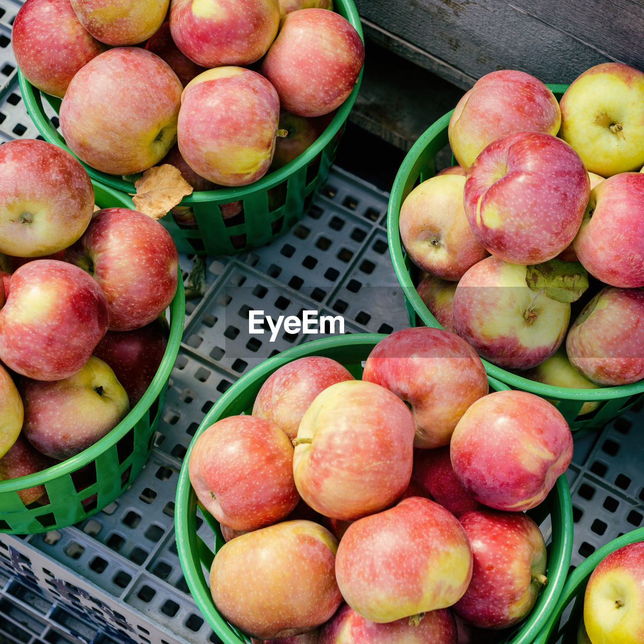 High angle view of apples in basket for sale