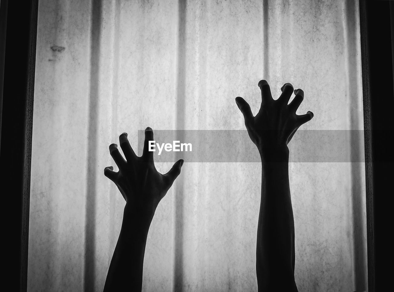 SILHOUETTE MAN WITH HANDS