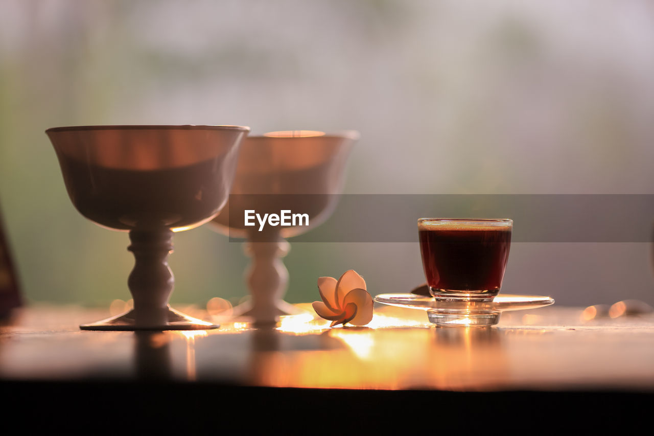 CLOSE-UP OF COFFEE SERVED ON TABLE WITH TEA