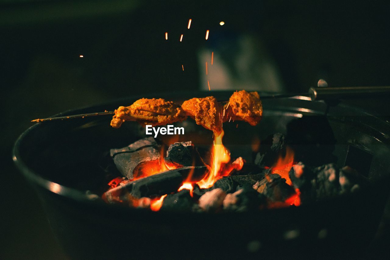 Close-up of bonfire on barbecue grill