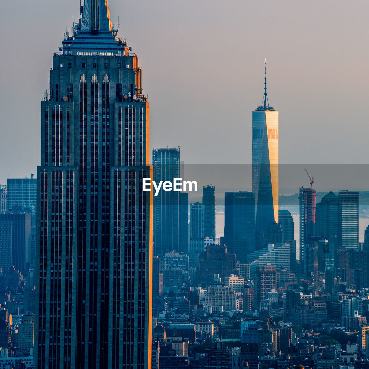 Modern buildings in city against sky