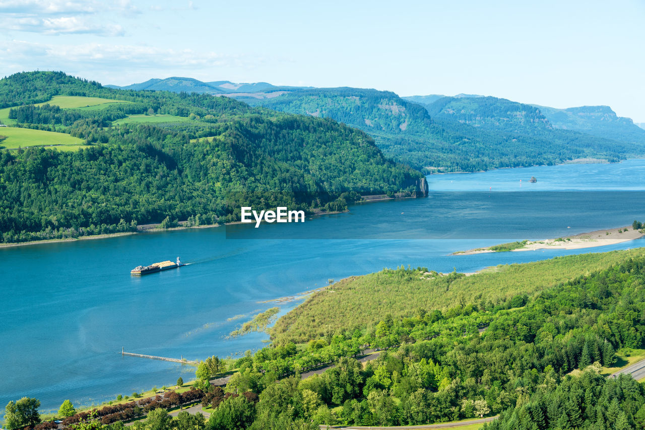 Scenic view of river against sky