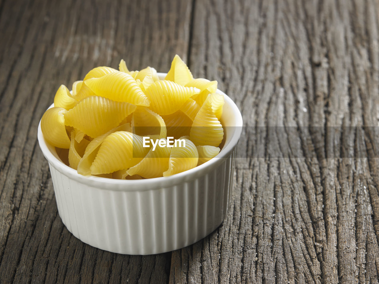 Close-up of conchiglie pasta on table