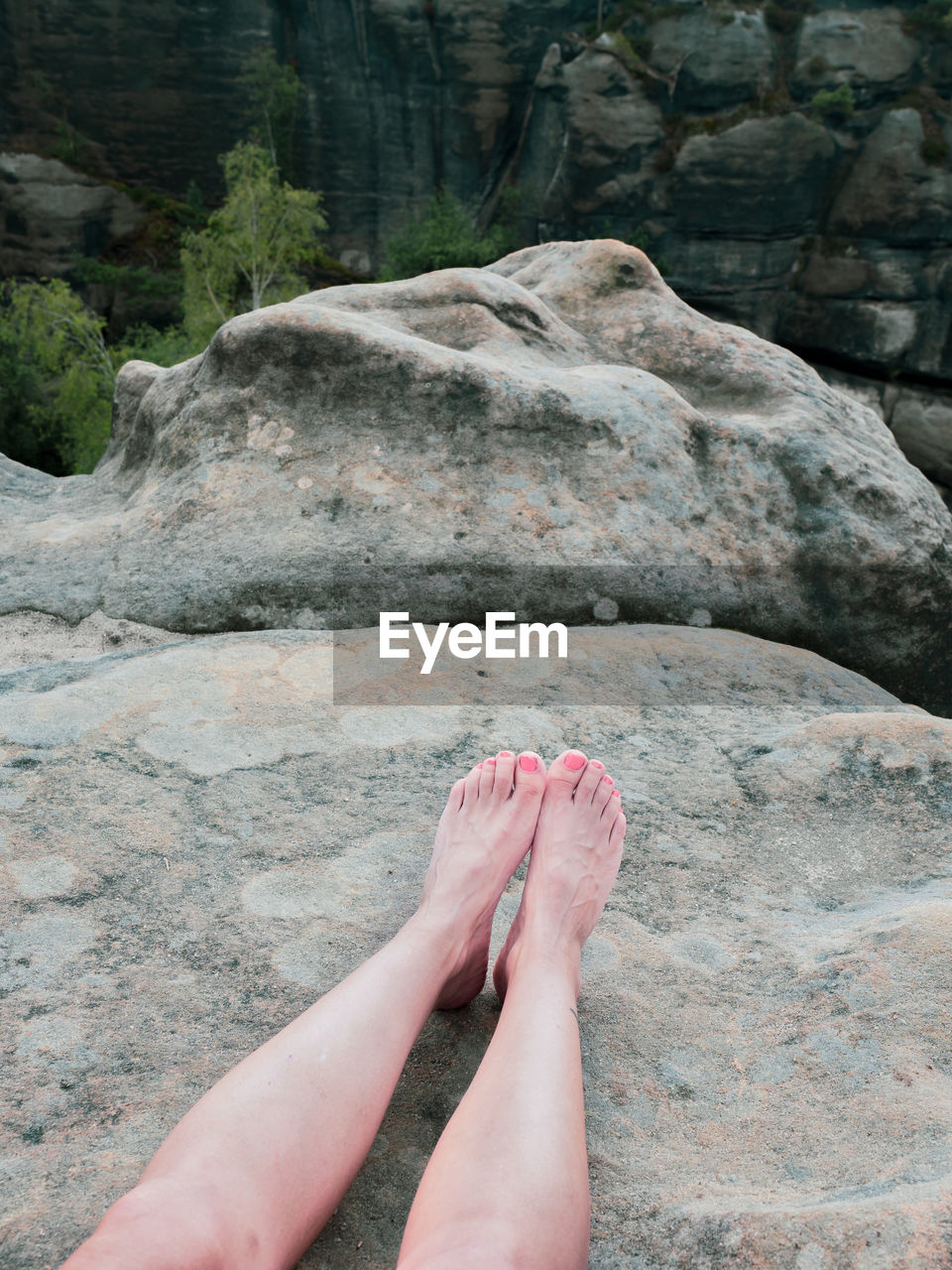 Bare foot with rocky mountain nature background, relax travel concept. and fun