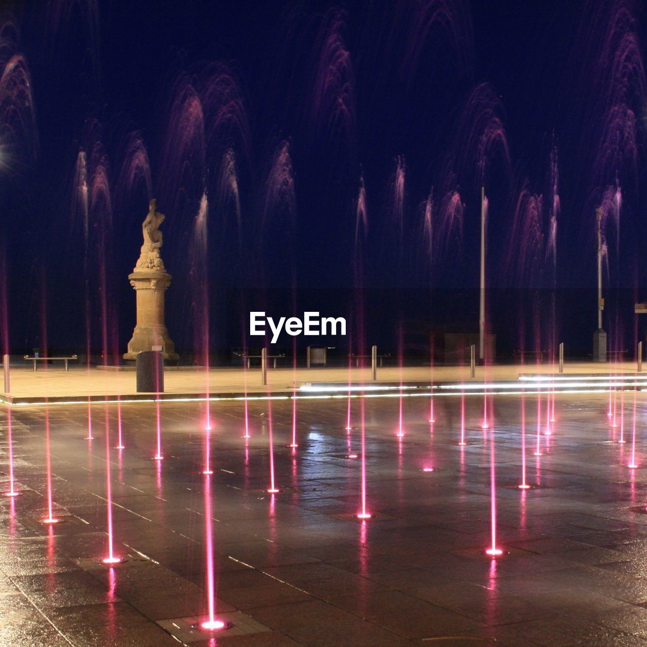 ILLUMINATED FOUNTAIN IN DARK