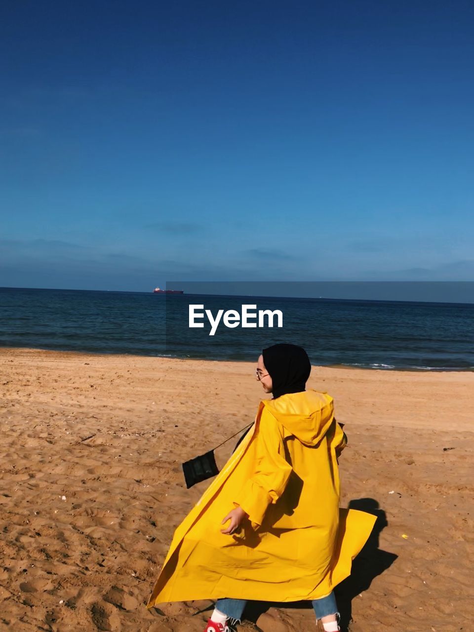 Rear view of man on beach