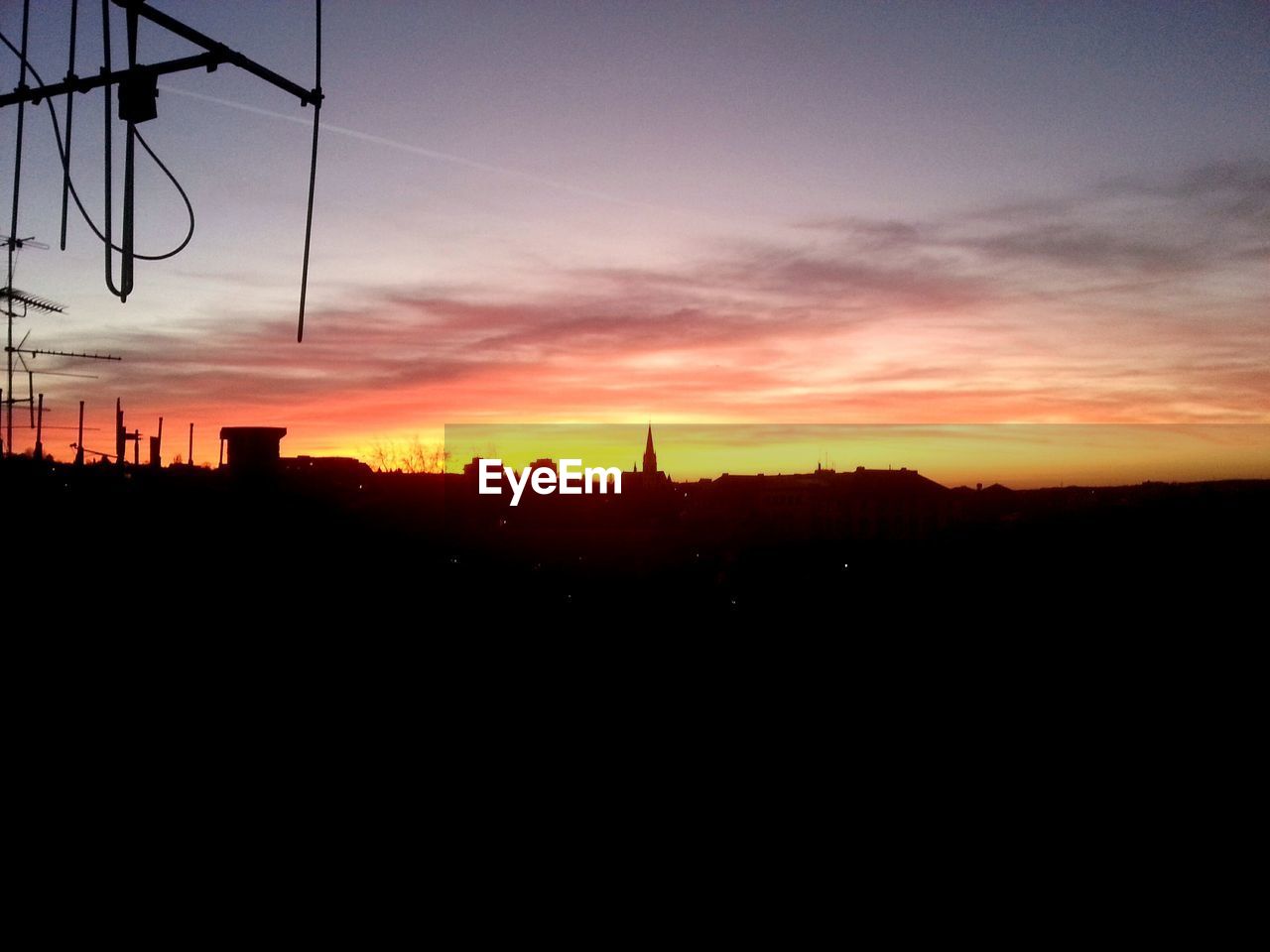 SILHOUETTE OF LANDSCAPE AT SUNSET