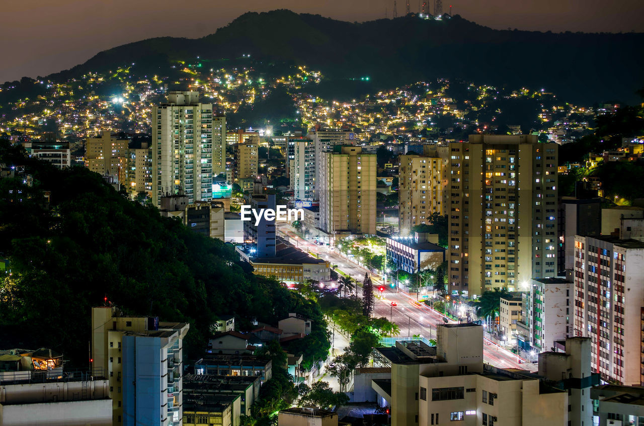 High angle view of illuminated buildings in city