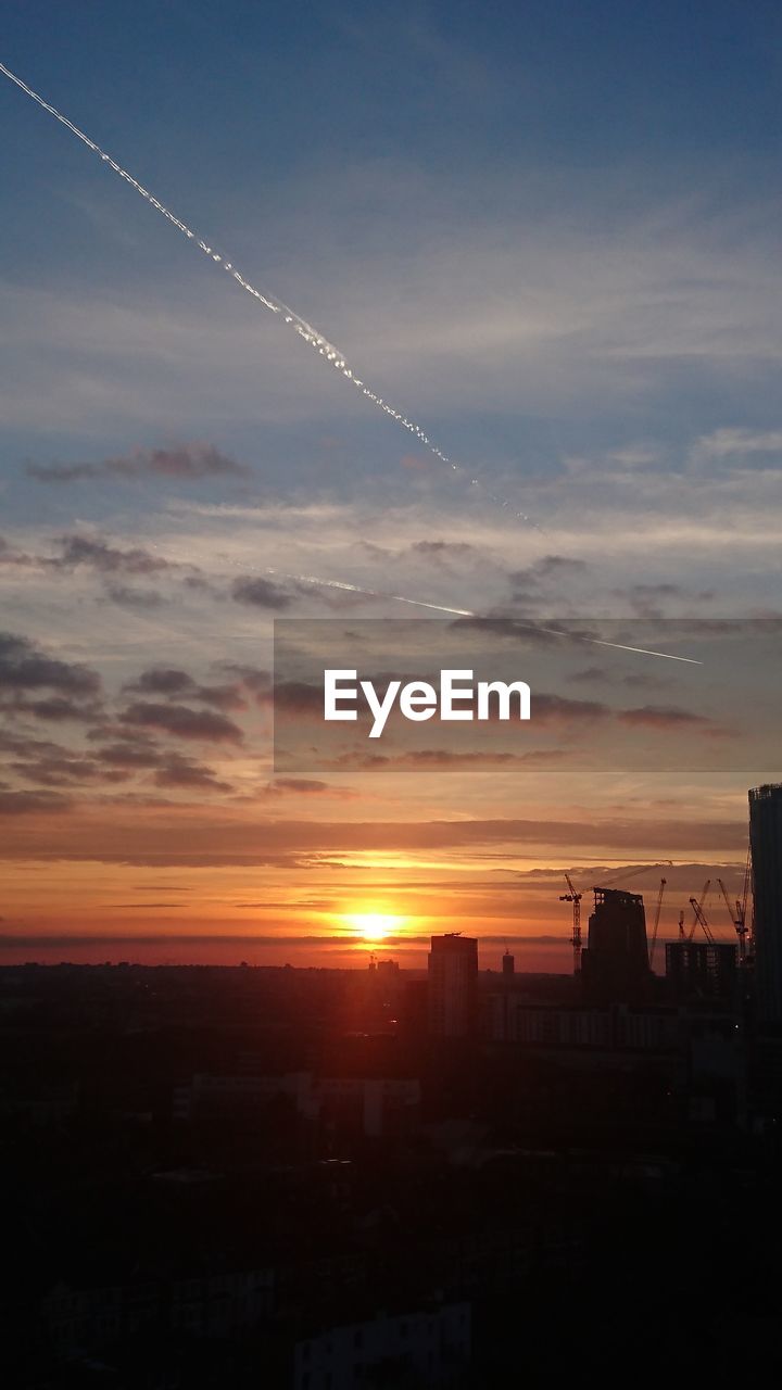 Field against sky during sunset