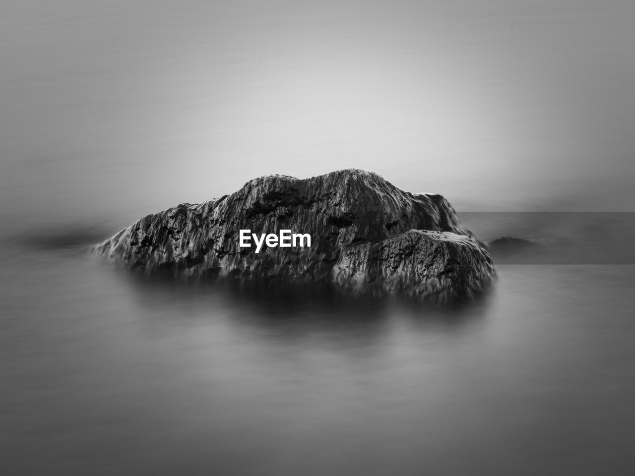 ROCK FORMATIONS BY SEA AGAINST SKY