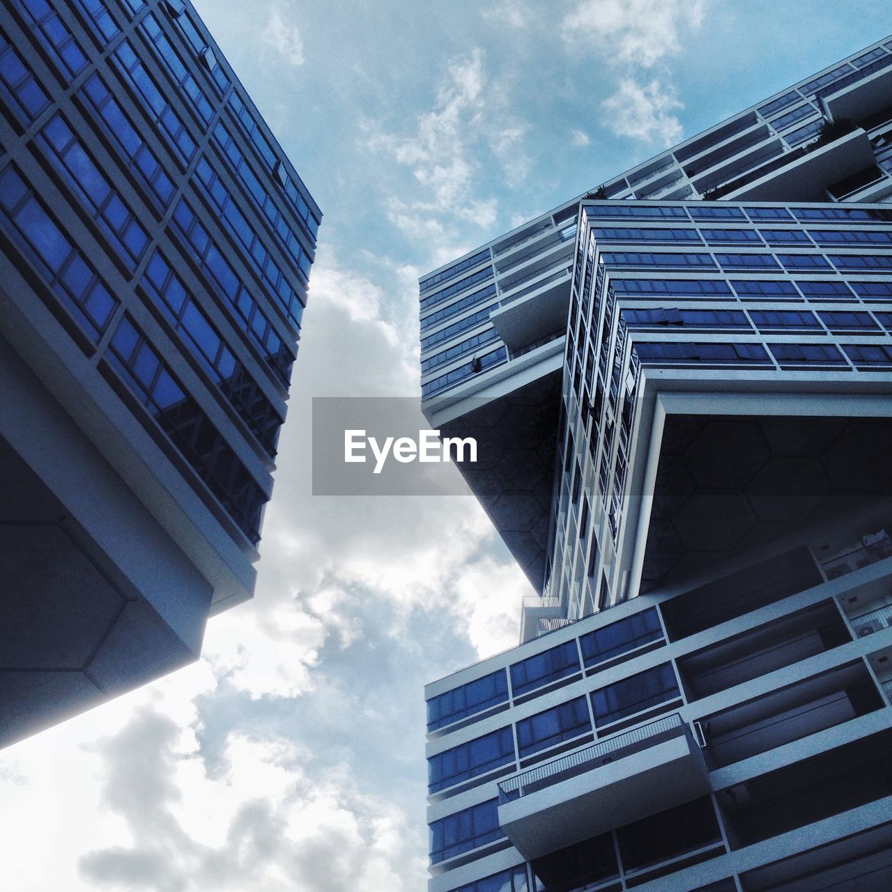 Low angle view of modern buildings against sky